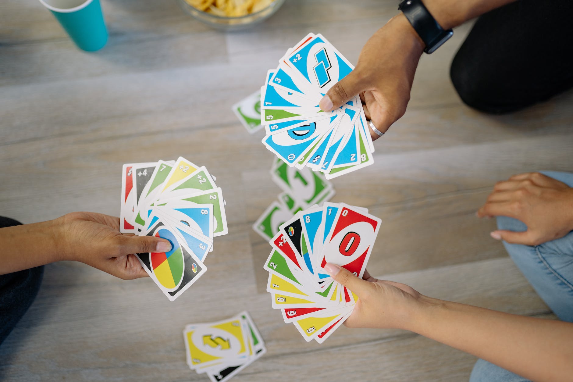 people playing uno