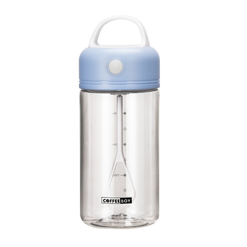 Mint green portable blender bottle and electric protein shaker