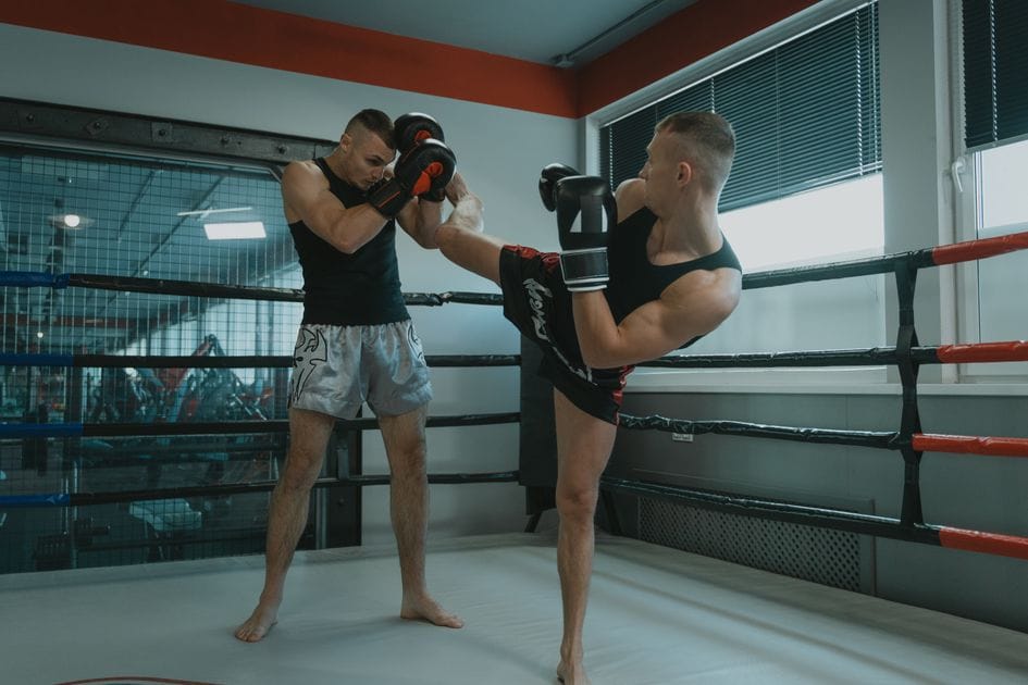 Muay Thai kick pad training session