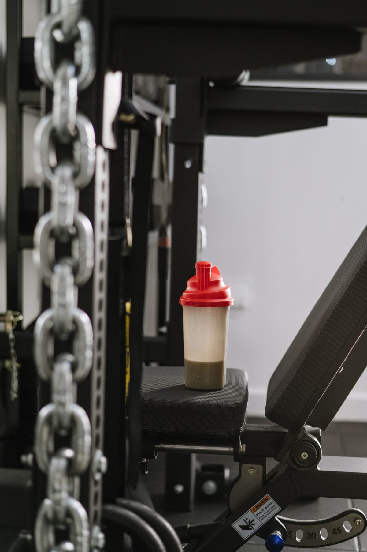 Protein shaker bottle on gym equipment — protein shaker bottle buying tips