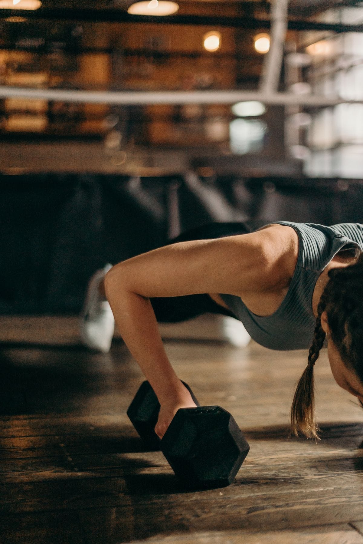 certified personal trainer demonstrating an exercise
