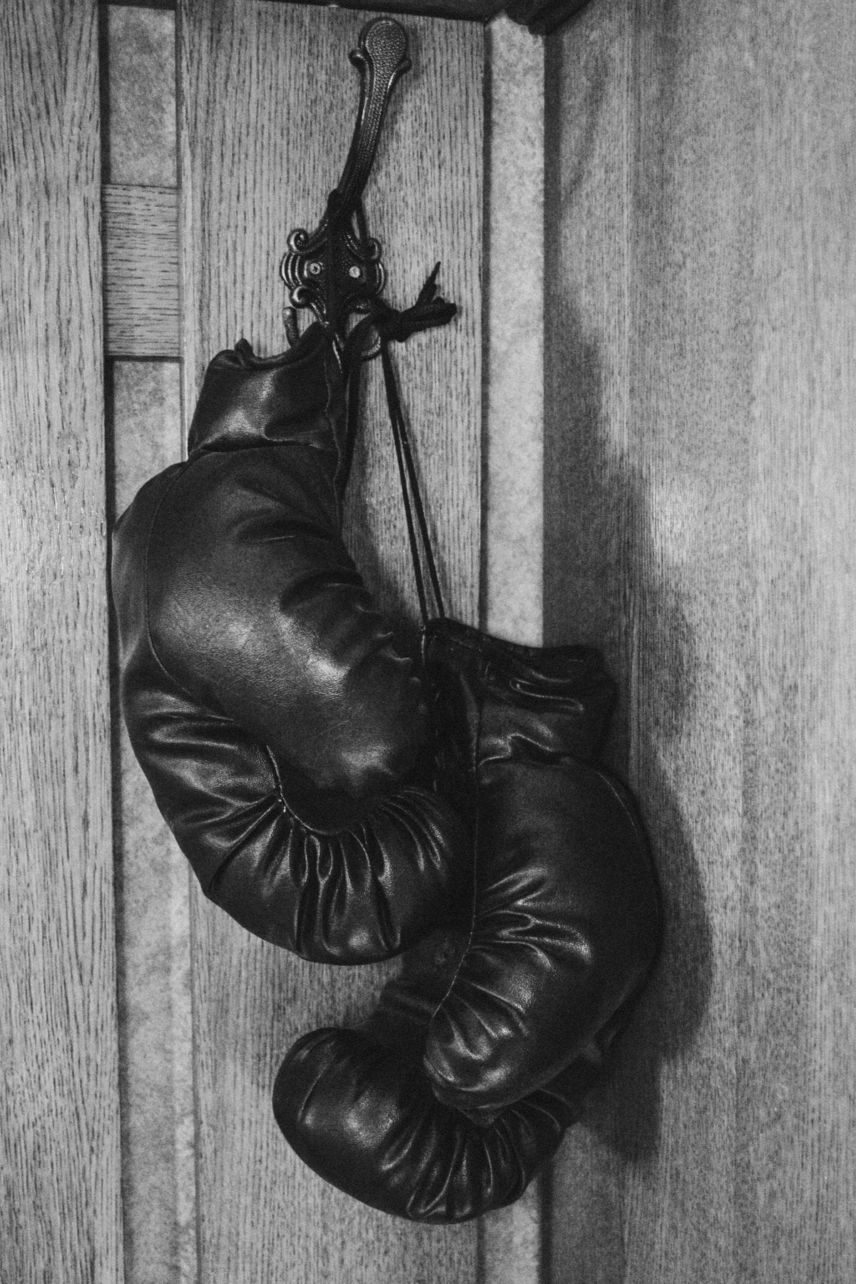Boxing gloves hanging on a wall for air-drying and storage