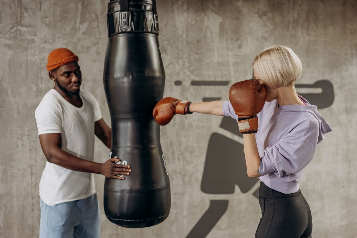 Thai boxing class pad work with coach